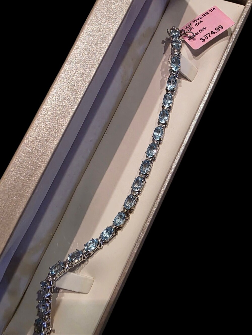 Sterling Silver Blue Topaz 12.50 CT Tennis Bracelet - Elegant Blue Gemstone